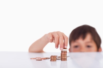 Young boy counting his change