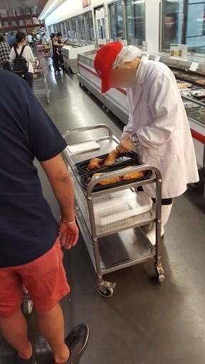 costco_serves_chicken_leg_for_service_10_sh